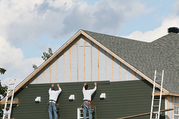 Professional Siding Installation technician working in Newton Upper Falls, MA